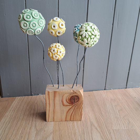 Kate Ellis - Ceramic flowers on wooden base