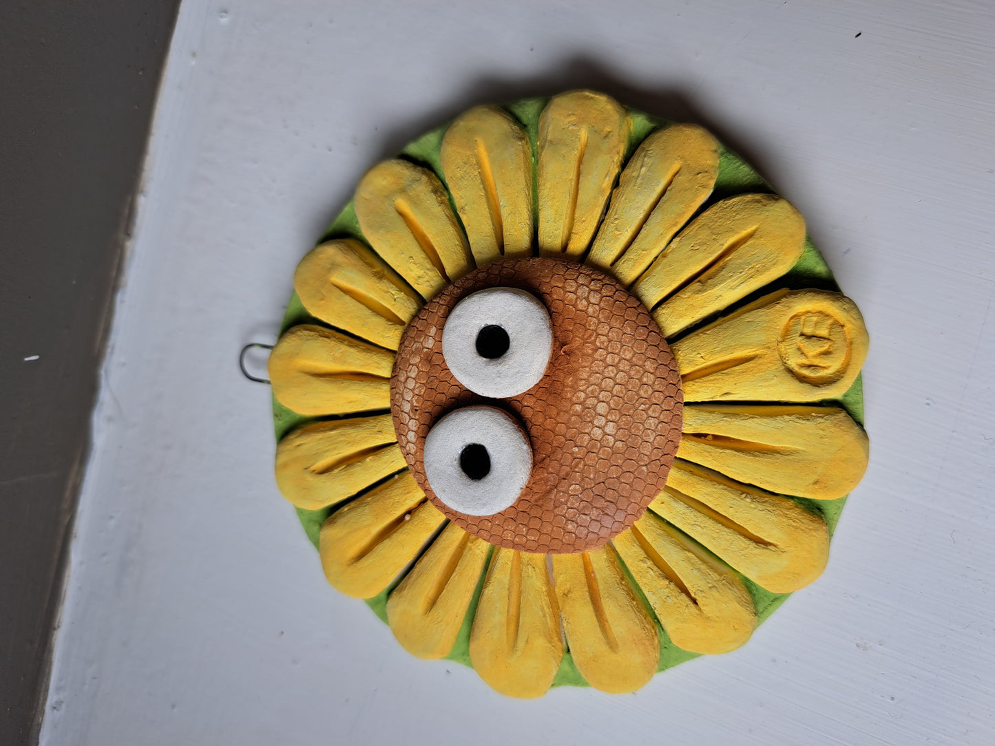 Kate Ellis - Flower round wall hanging