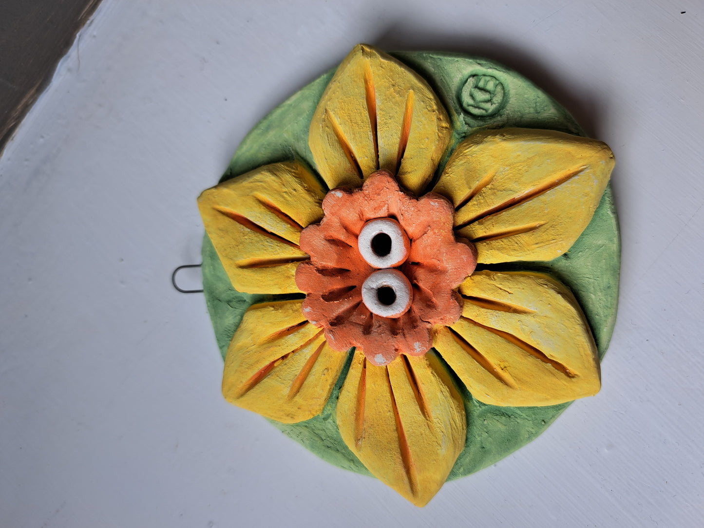 Kate Ellis - Flower round wall hanging