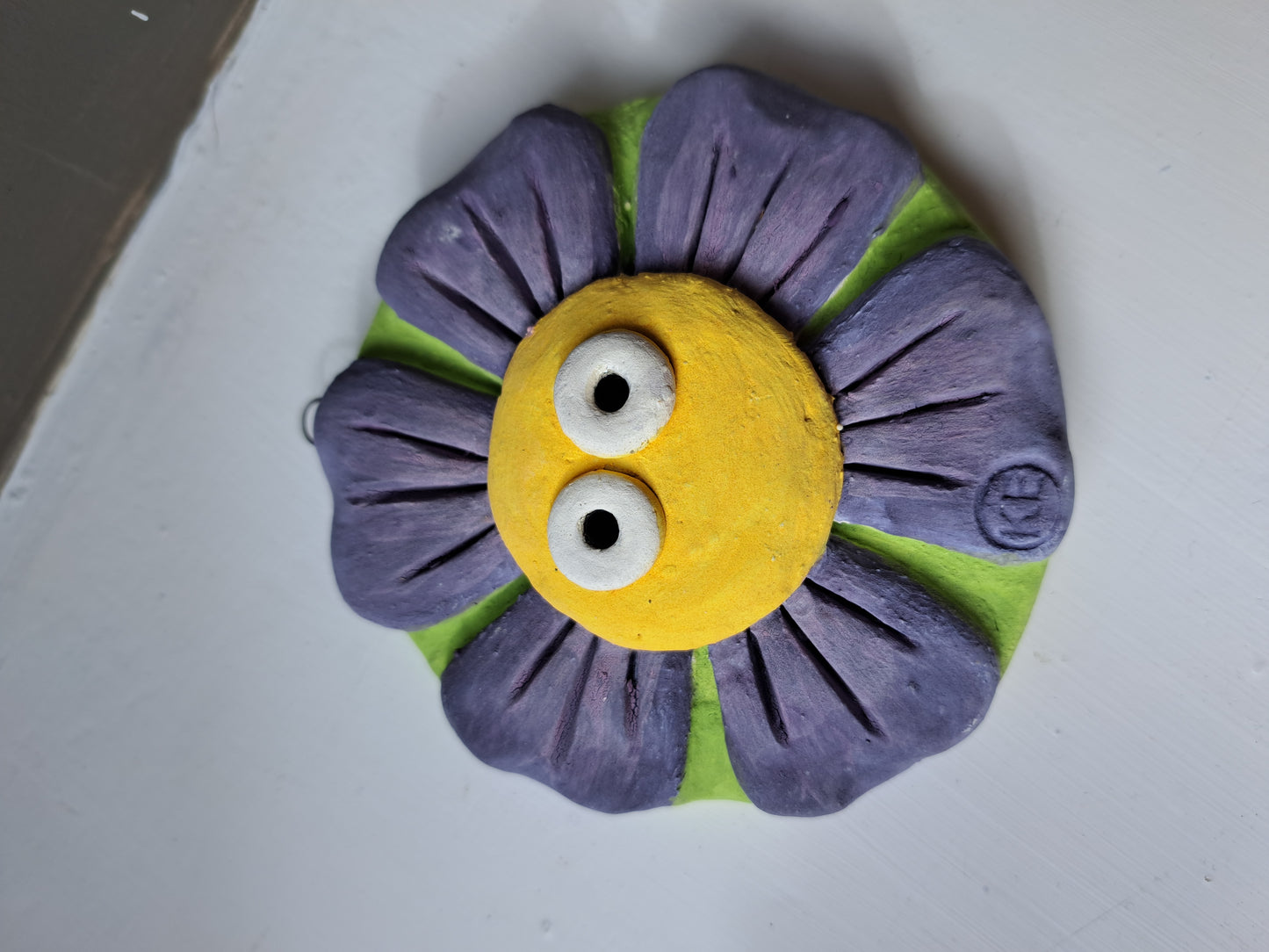 Kate Ellis - Flower round wall hanging