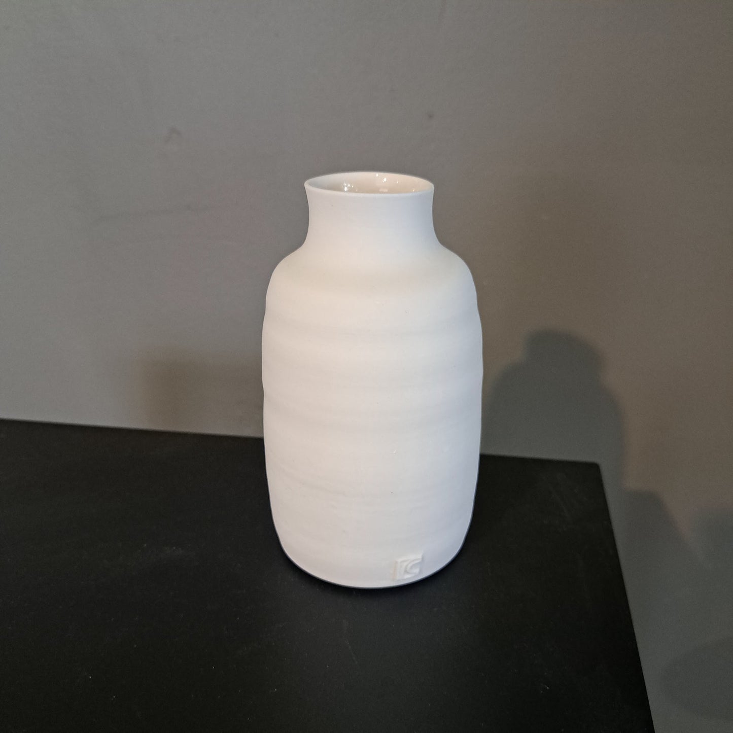 Rebecca Callis Porcelain - Unglazed white bottles