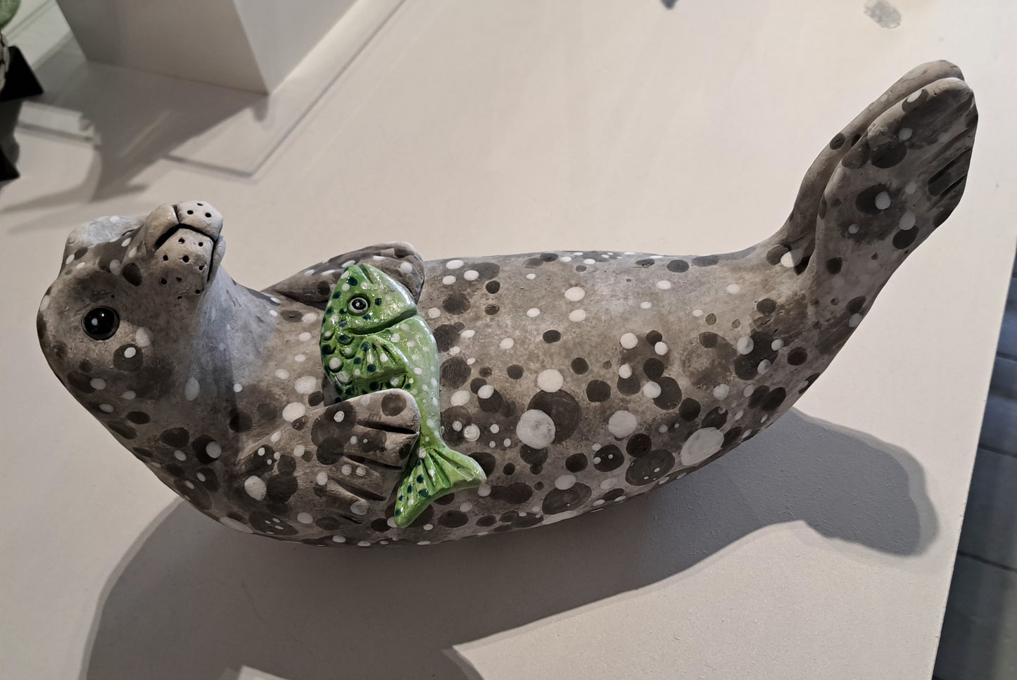 Kate Ellis - Grey seal with Green Fish