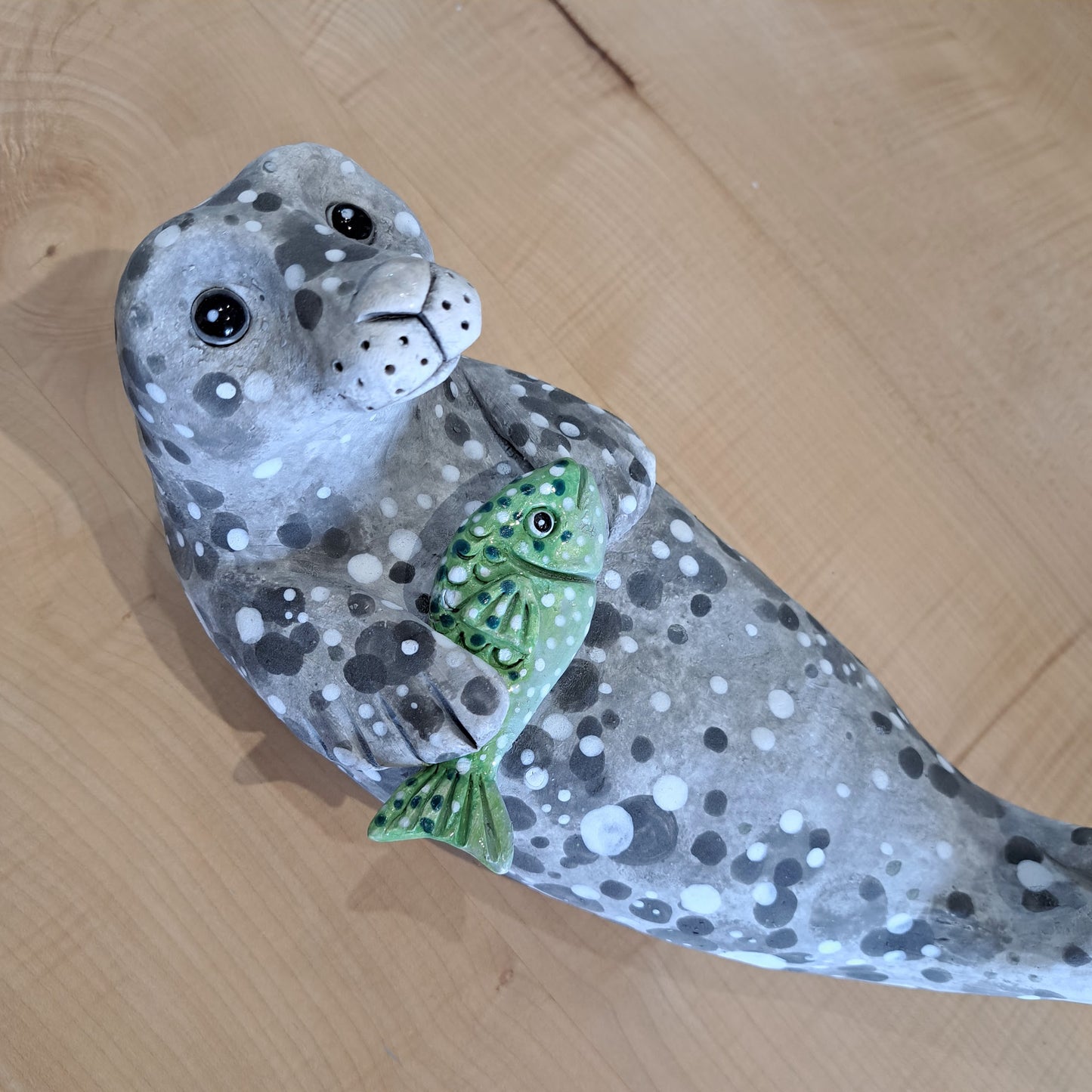 Kate Ellis - Grey seal with Green Fish