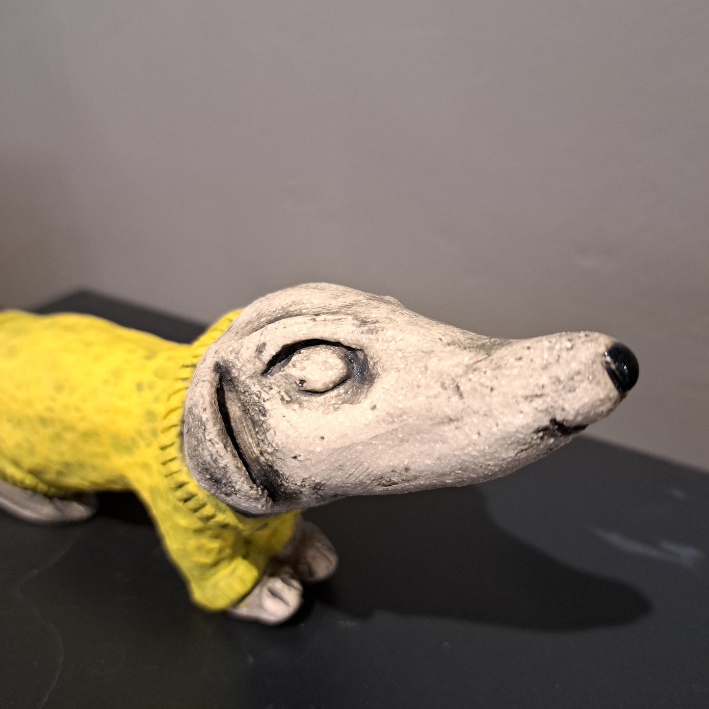Christine Hughes Sculptures - Daschund with yellow jumper