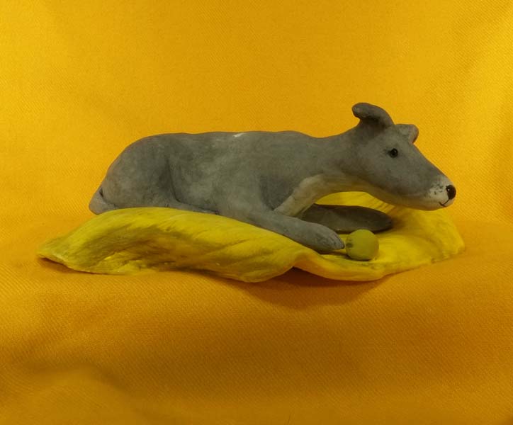 Christine Hughes - Sculptures - Whippet on yellow blanket