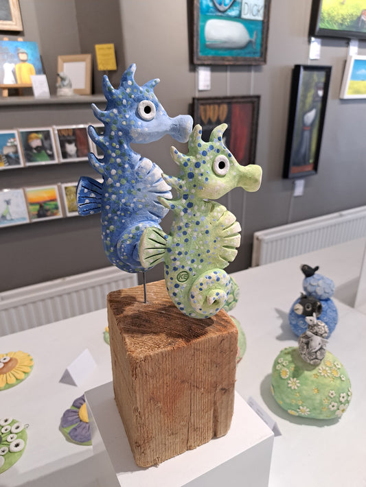 Kate Ellis - Two seahorses on wood