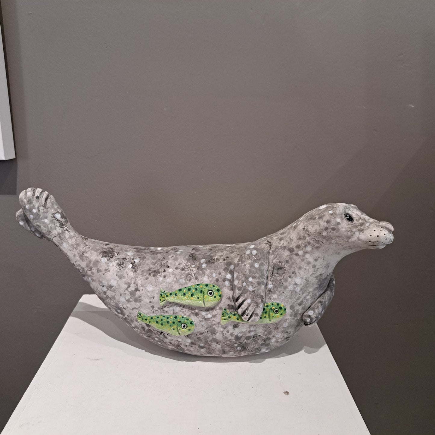 Kate Ellis - Large Grey seal with Green shoal of fish