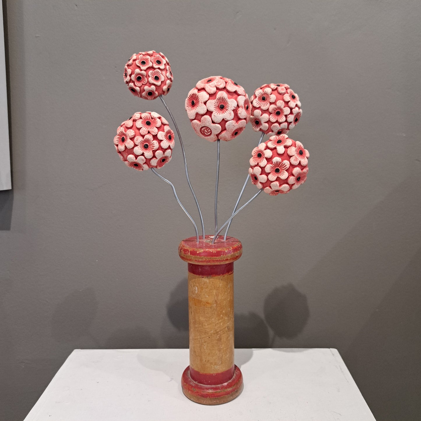 Kate Ellis - Ceramic flowers on wooden Vintage Cotton Reel Base