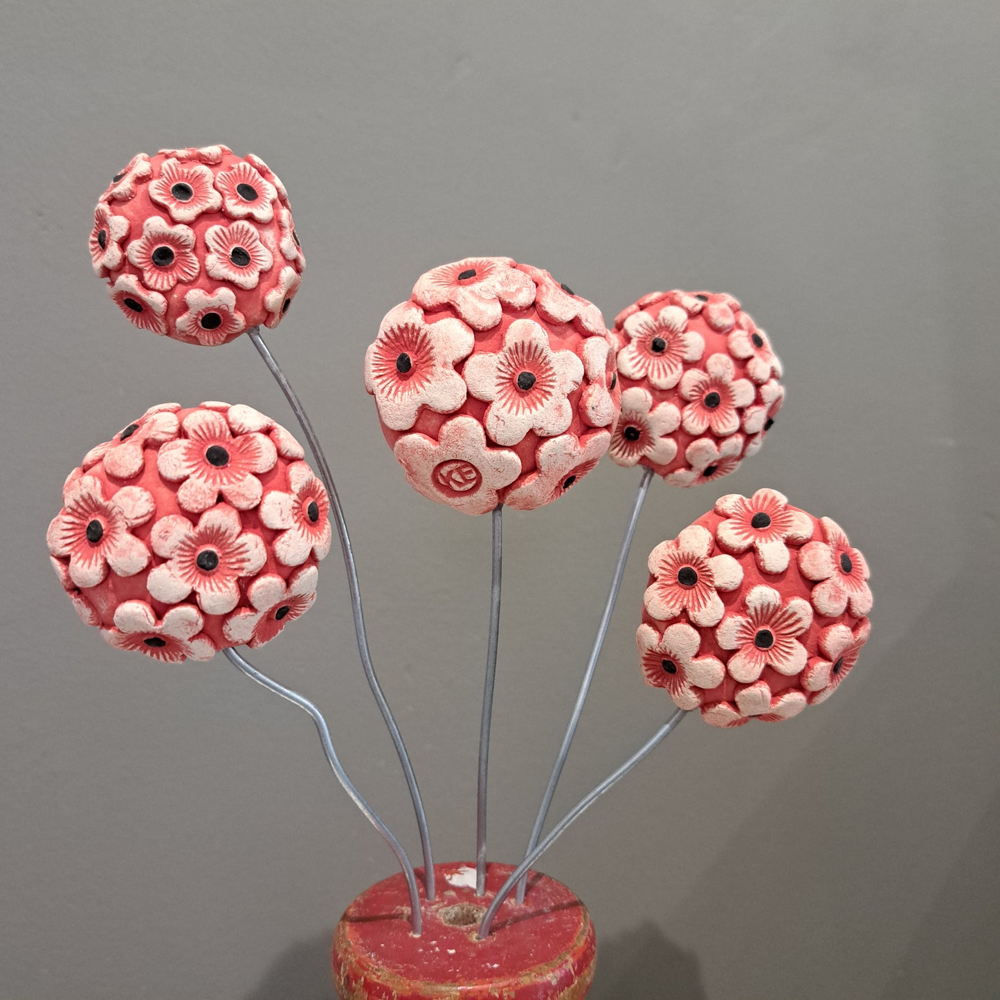 Kate Ellis - Ceramic flowers on wooden Vintage Cotton Reel Base