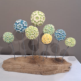Kate Ellis - Ceramic flowers on wooden base