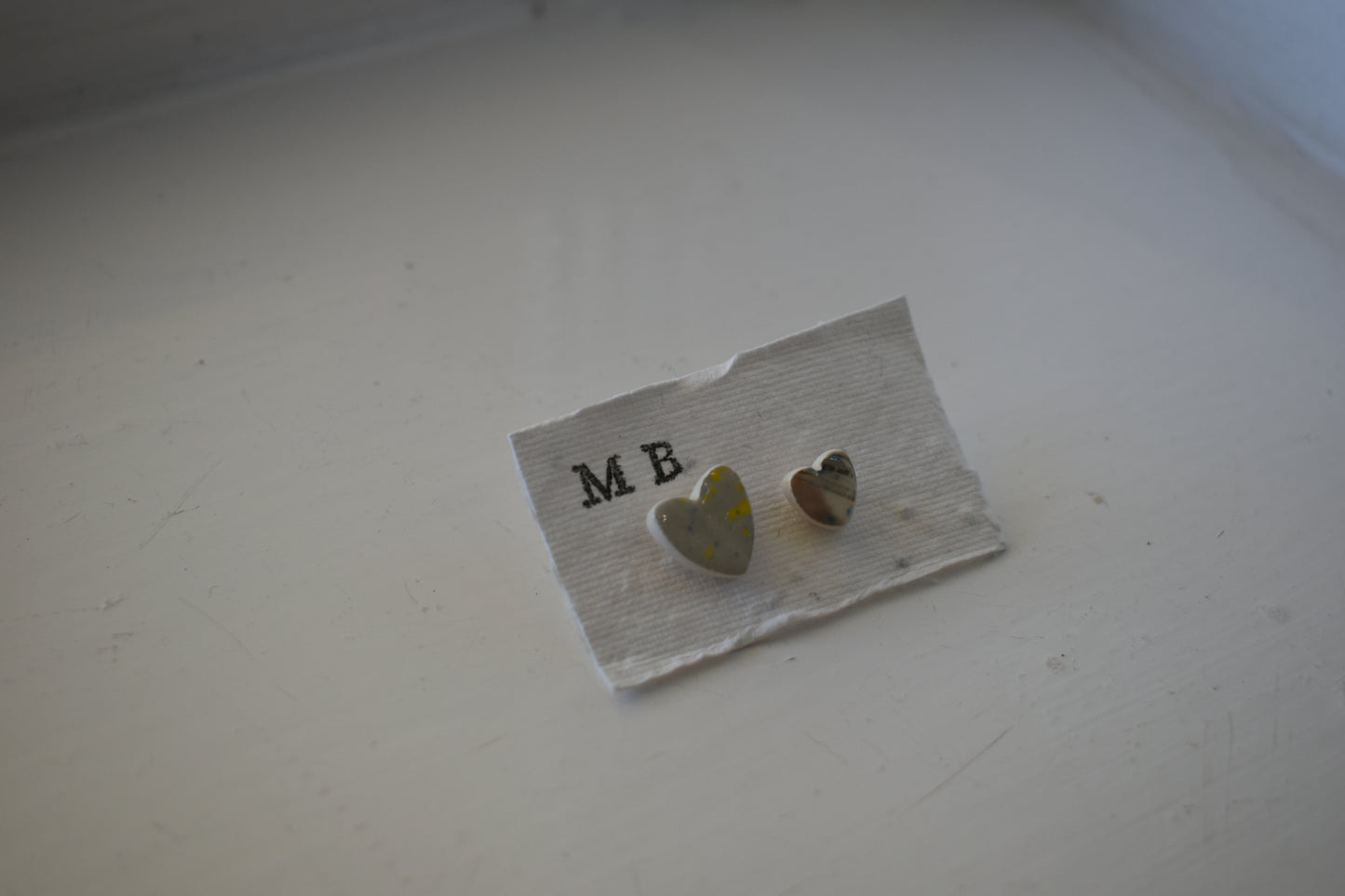 Matilda Belle Ceramic Jewellery - mismatched grey heart stud earrings