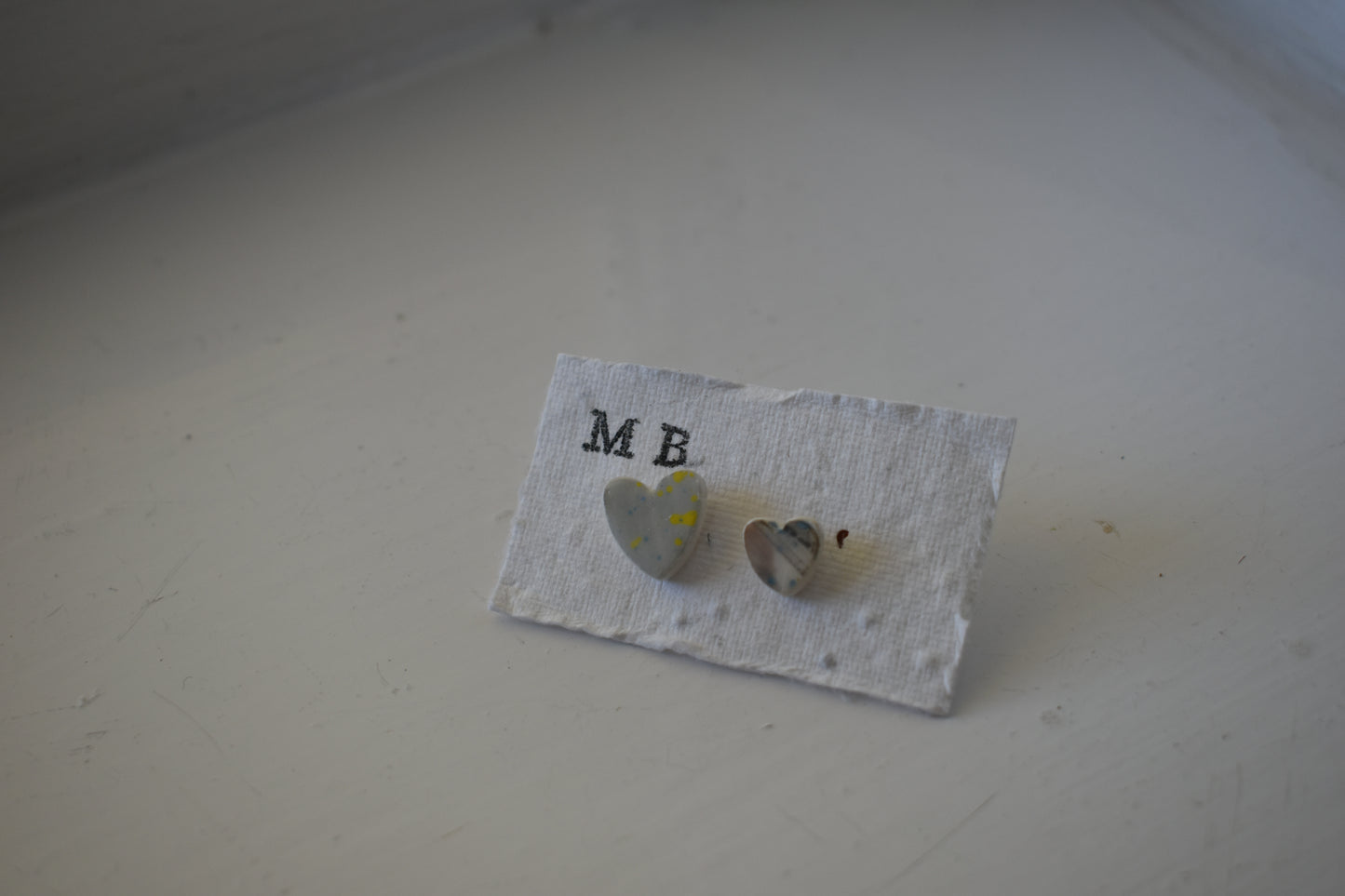 Matilda Belle Ceramic Jewellery - mismatched grey heart stud earrings