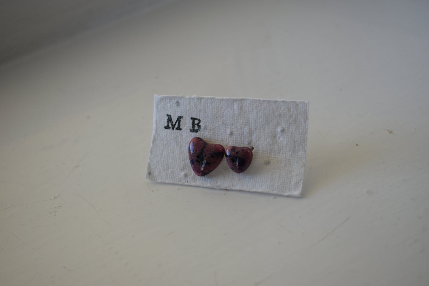 Matilda Belle Ceramic Jewellery - mismatched purple heart stud earrings