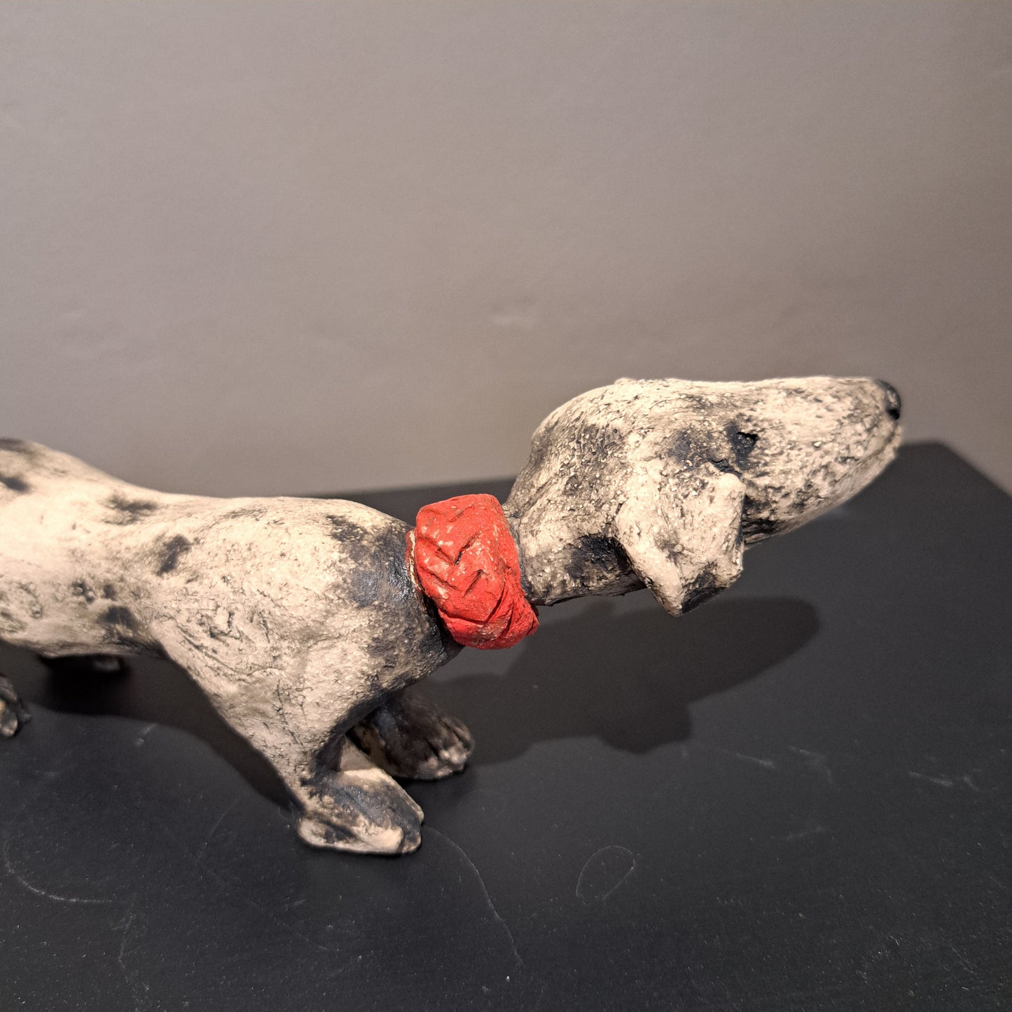 Christine Hughes Sculptures - Daschund with red collar