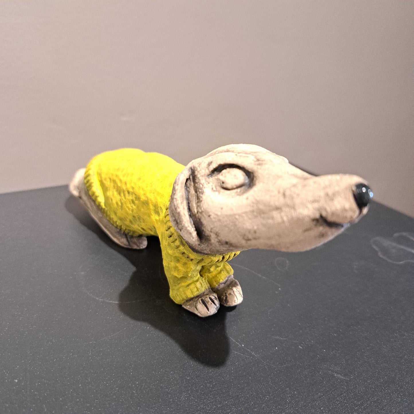 Christine Hughes Sculptures - Daschund with yellow jumper
